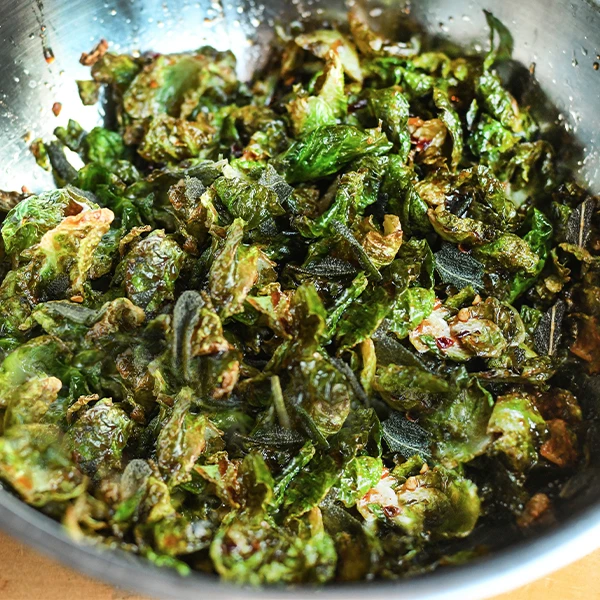 Brussels leaves tossed with hot honey sauce & crispy sage.